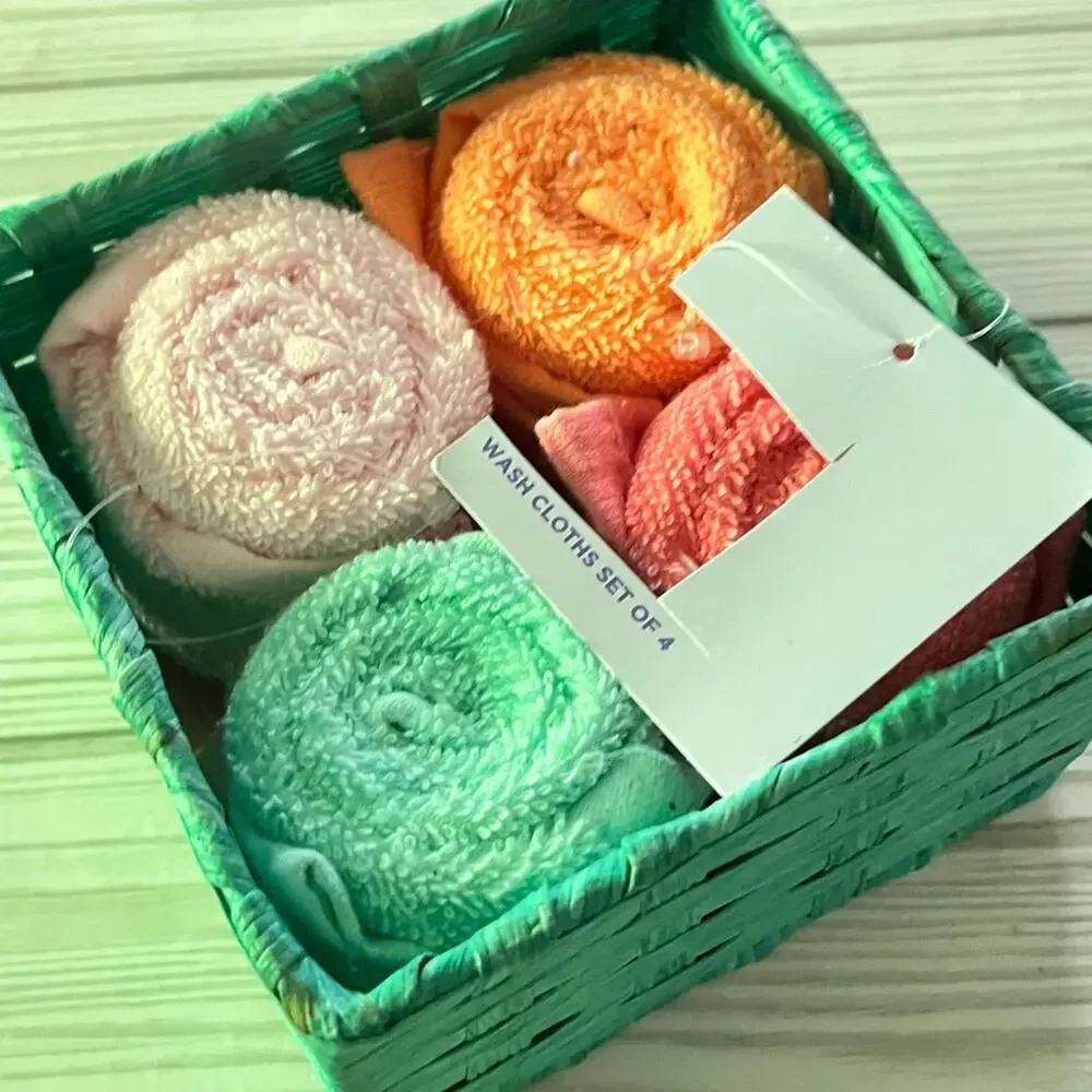 Colorful Rolled Wash Cloths in Basket